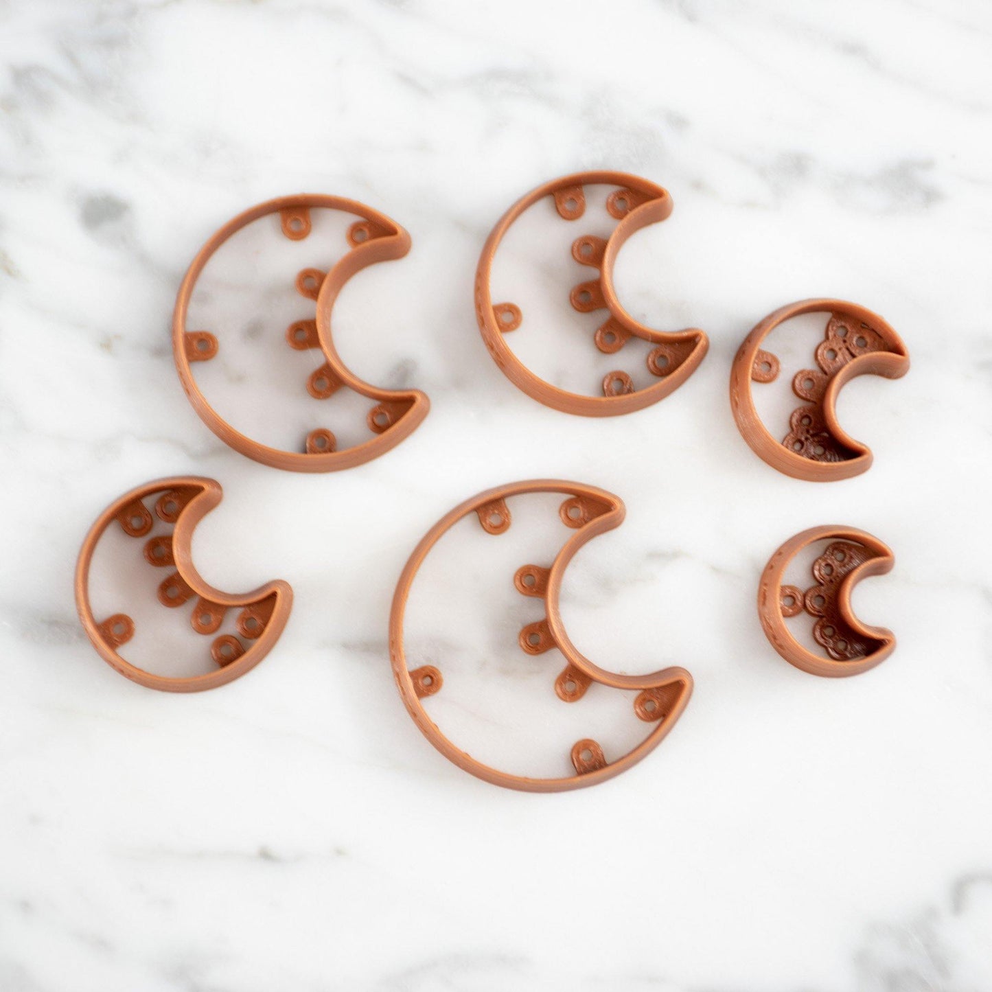 Moon Cutters - handmade earrings - handcrafted earrings - Saint Petersburg, Florida